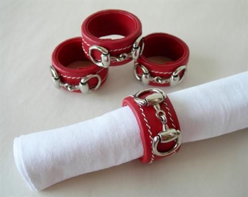 https://warmbloodtackstore.com/cdn/shop/products/lilo-of-spain-home-goods-red-silver-leather-cleo-english-snaffle-bit-napkin-ring-holder-1264098752_500x399.jpg?v=1575546454